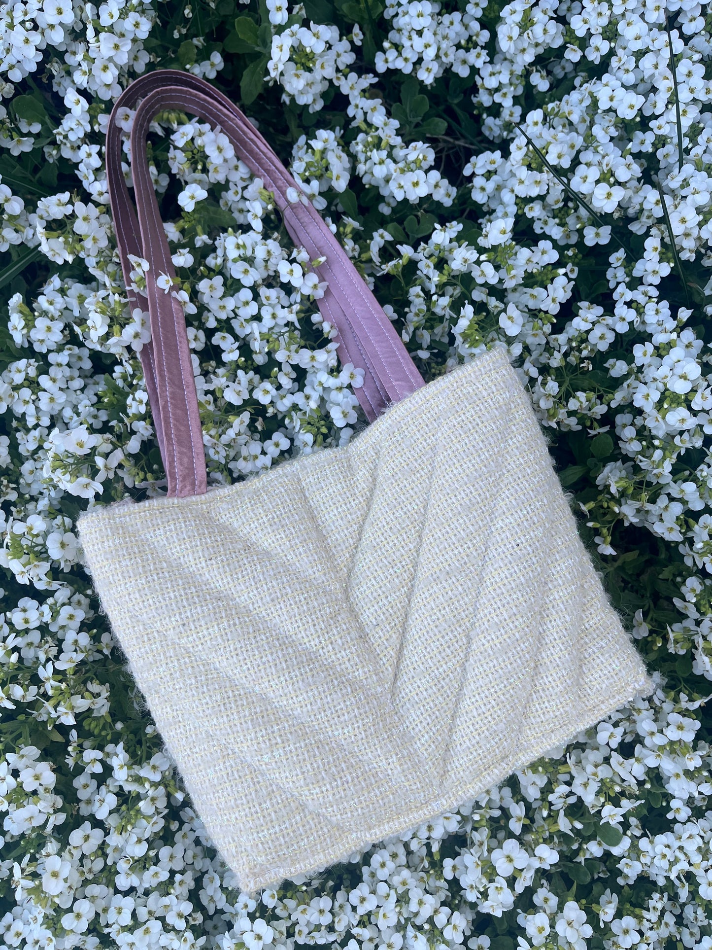 The Ouseburn large-sized tweed handbag, finished with structured satin handles and polished metal hardware for everyday elegance.