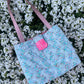 The Hexham large tote bag made from premium tweed, complete with structured satin handles and refined metal hardware