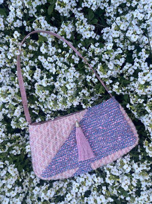 The Embleton baguette style tweed handbag with structured satin handles and refined metal hardware, blending classic style with everyday functionality.